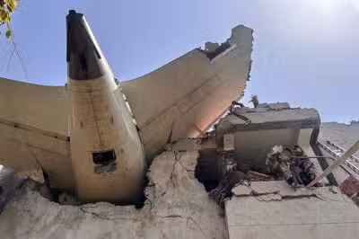 This handout taken and posted on the X (formerly Twitter) account of the Central Industrial Security Force (CISF) On June 12, 2025 shows the back of an Air India plane after it crashed in a residential area near the airport in Ahmedabad. The London-bound Air India flight 171 passenger plane crashed on June 12 in India's western city of Ahmedabad with 242 on board, aviation officials said in what the airline called a