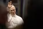 Pope Leo XIV waves at the end of a Jubilee audience on June 14, 2025 at St Peter's basilica in The Vatican. (Photo by Filippo MONTEFORTE / AFP)