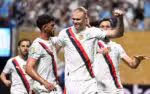 Manchester City's Norwegian striker #09 Erling Haaland (R) celebrates with teammate Portuguese midfielder #27 Matheus Nunes after scoring his team's third goal during the FIFA Club World Cup 2025 Group G football match between England's Manchester City and UAE's Al Ain FC at the Mercedes-Benz stadium in Atlanta on June 22, 2025. (Photo by PATRICIA DE MELO MOREIRA / AFP)