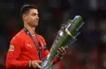 Munich (Germany), 09/06/2025.- Cristiano Ronaldo of Portugal looks at the trophy after the UEFA Nations League final match between Portugal and Spain in Munich, Germany, 08 June 2025. (Alemania, España) EFE/EPA/ANNA SZILAGYI