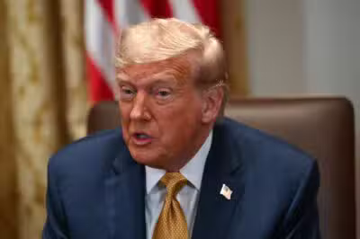 US President Donald Trump speaks during a cabinet meeting in the Cabinet Room of the White House in Washington, DC, on July 8, 2025. (Photo by ANDREW CABALLERO-REYNOLDS / AFP)